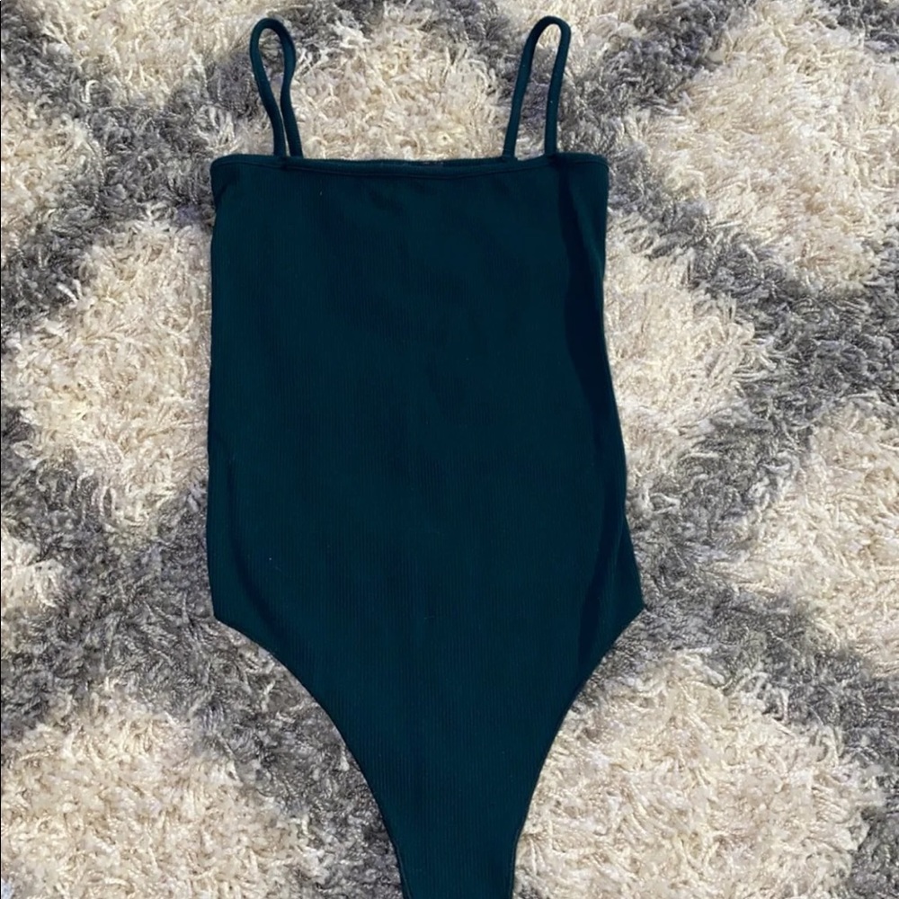 Brandy Melville body suit NEVER WORN
